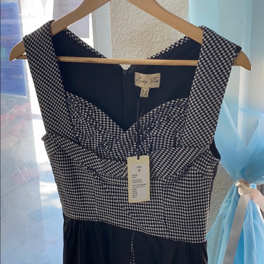 AVIS' BLACK DOGTOOTH SWING DRESS